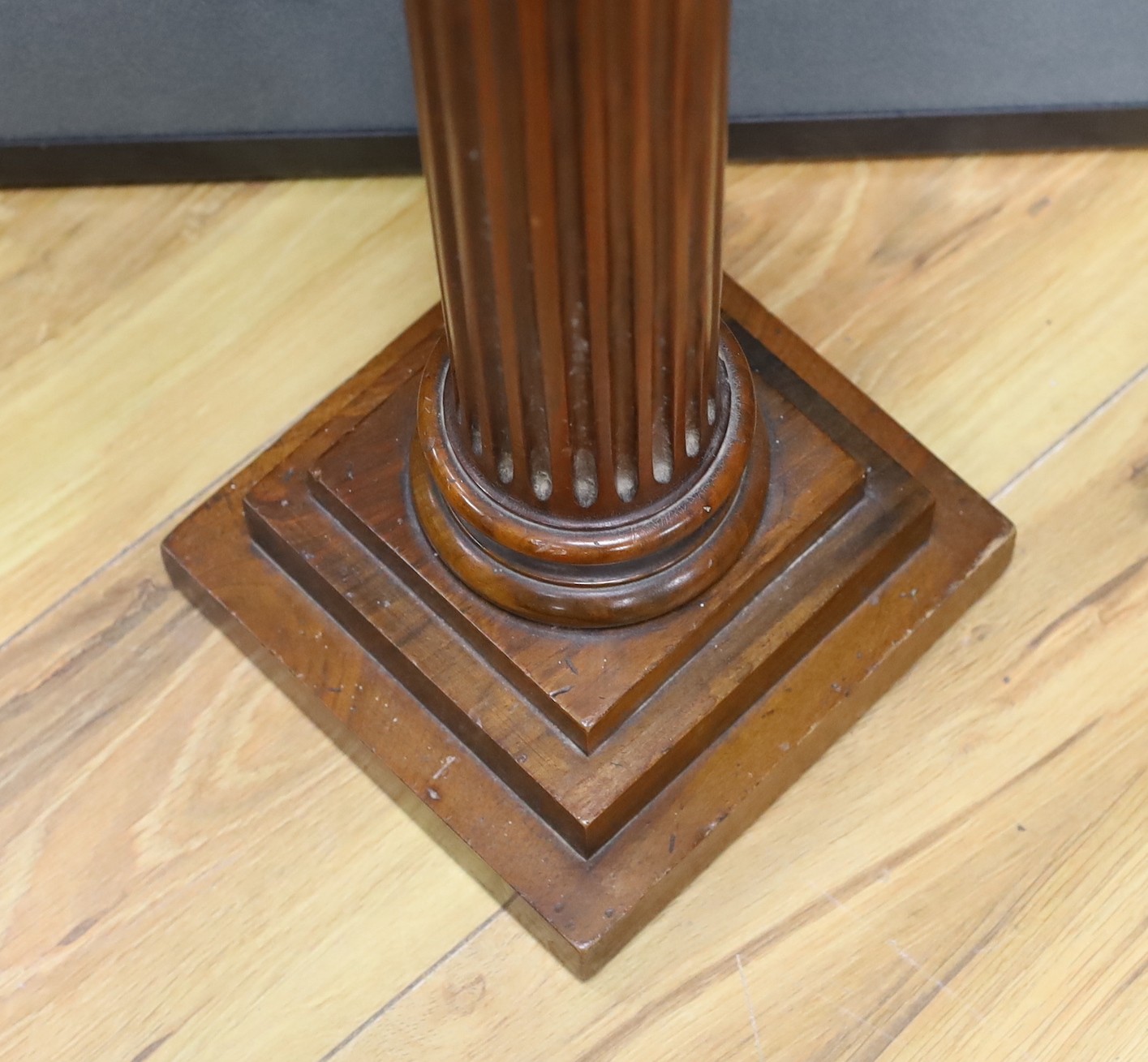 An early 20th century carved walnut Corinthian column, 80cm high